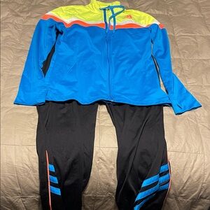 Adidas women’s neon and black vintage track suit